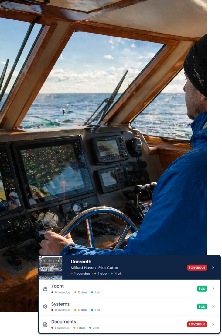 An owner at the helm of their yacht.